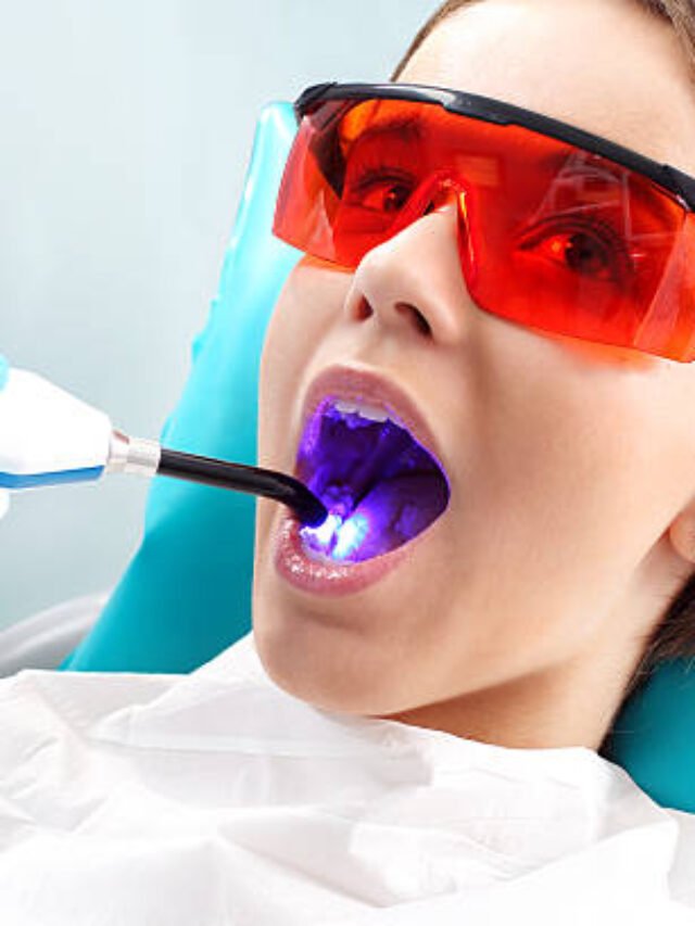 Woman at the dentist's chair during a dental procedure