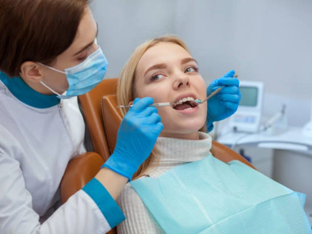 Patient receiving same day dental crown treatment with advanced dental technology and urgent care