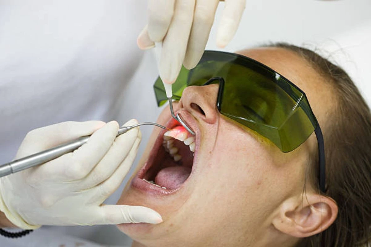 Patient receiving advanced laser dental treatment